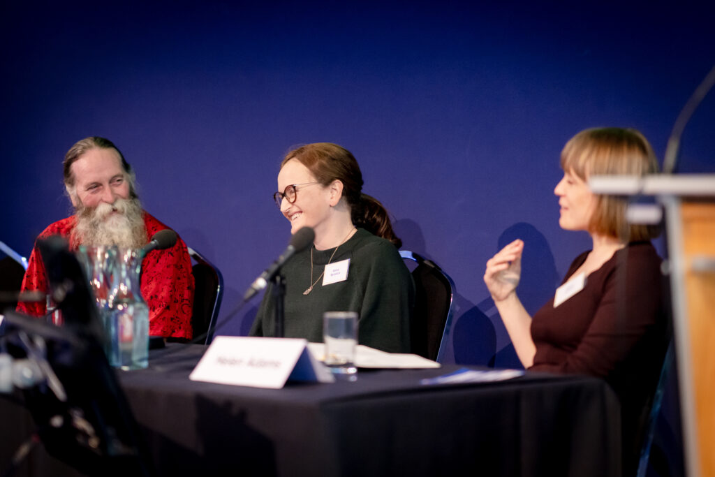 Three speakers take part in a panel discussion on MACC Programme research projects.